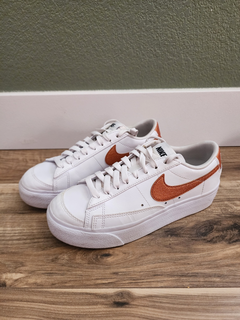 Nike White Sneakers with Orange Swoosh